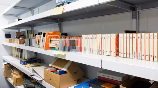 Archive shelf full of tape cases